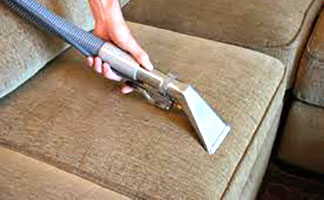 Sofa being cleaned